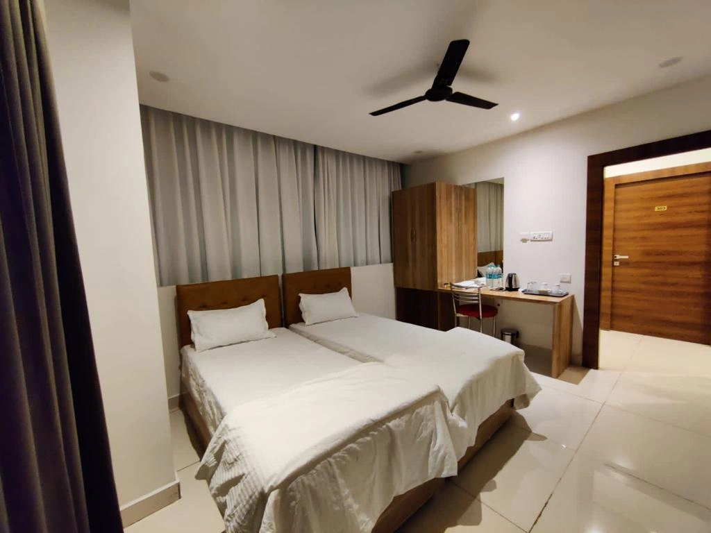 Twin Bed Room at Hotel Hibiscus Tree with modern decor